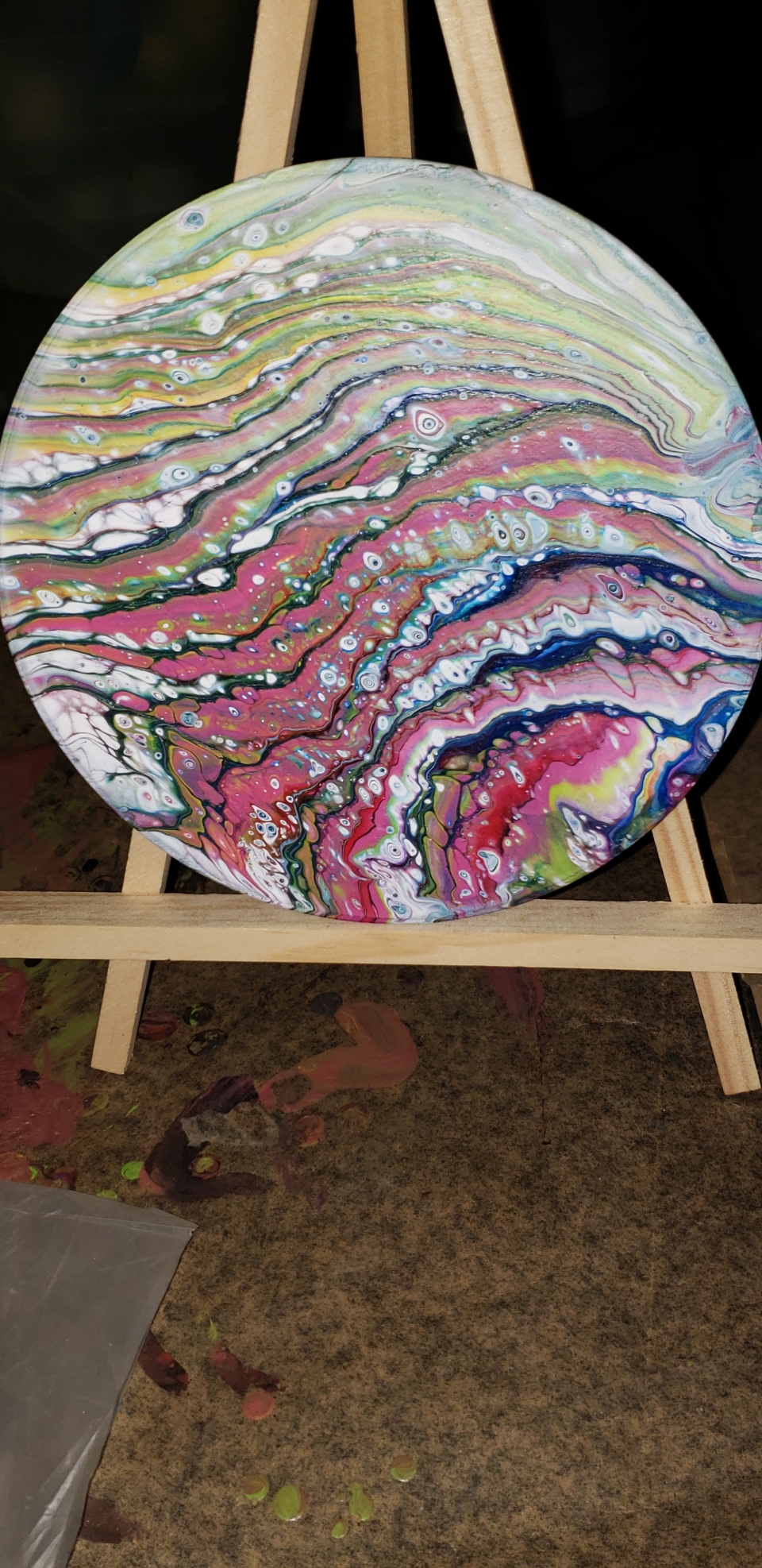 Paint pouring on wood